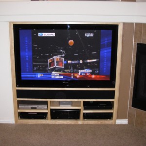 Replace your "old school" TV niche with our clean, built-in cabinet!